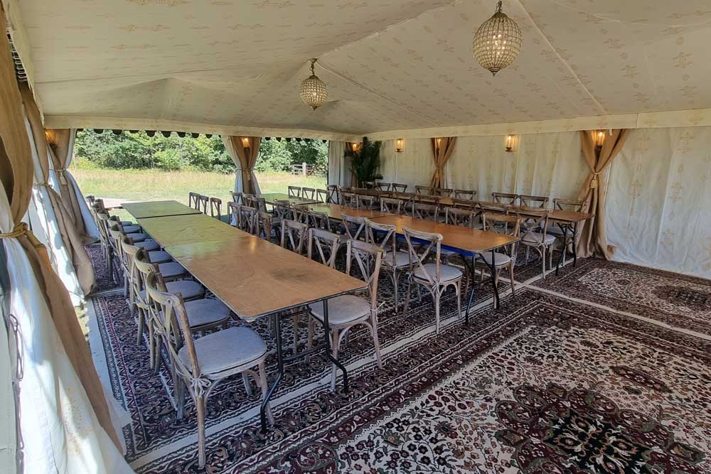 Rustic Dining in a Jasmine Lined 9x6m Arabian Tent.