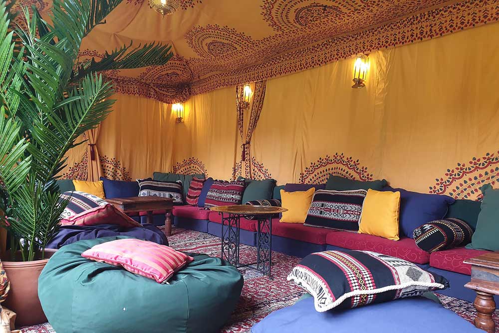 Chillout tent with hand block printed saffron linings