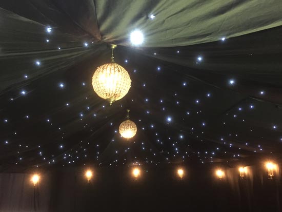 Starcloth Lining Creating an Effect of a Canopy of Stars Inside a 9x6m boutique Tent.