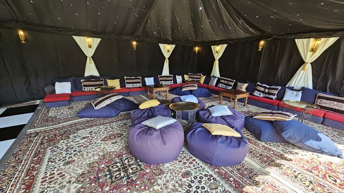 Starcloth Tent Interior with cream carpets and party furniture 