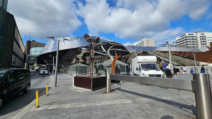 Two Bedouin tents and Attentive Events's van parked outside Birmingham's Bullring shopping center