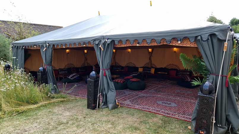 A 6x9m Bedoiun tent joined to a wedding marquee to provide extra space for guests to relax and dance.