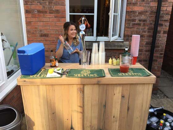 Reclaimed Pallet Wood Bar Unit Set Up for Serving Beer and Cocktails