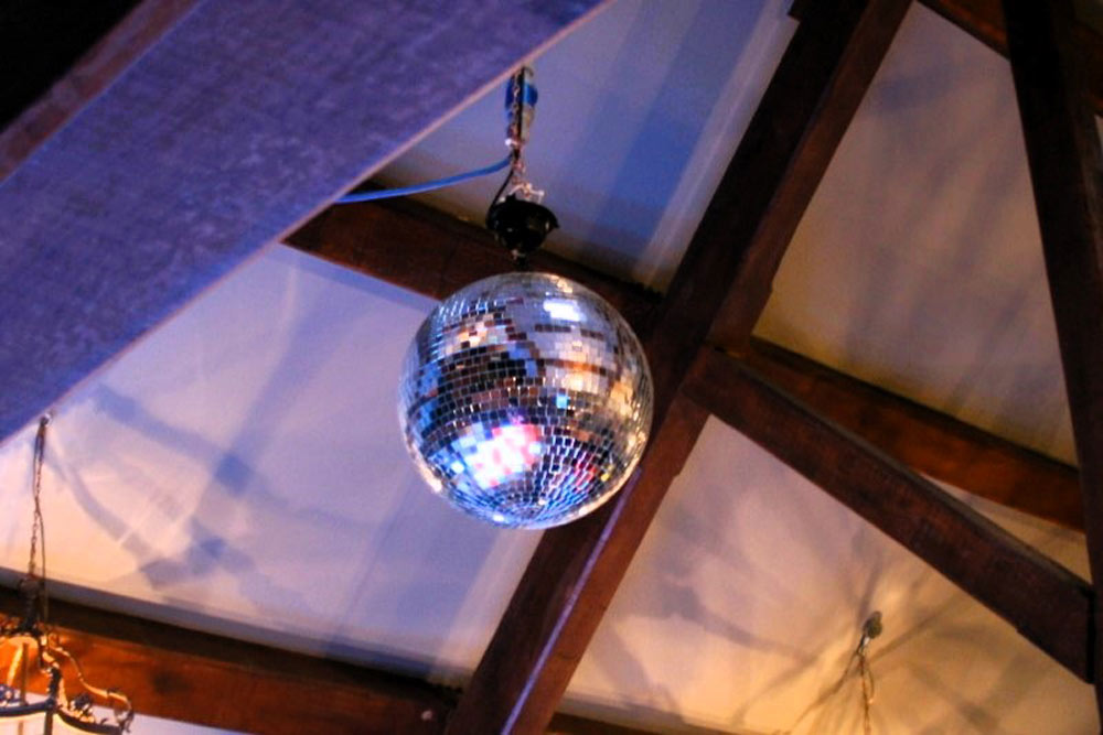 A 40cm mirror ball with spot lights out on hire and ready for the party to start