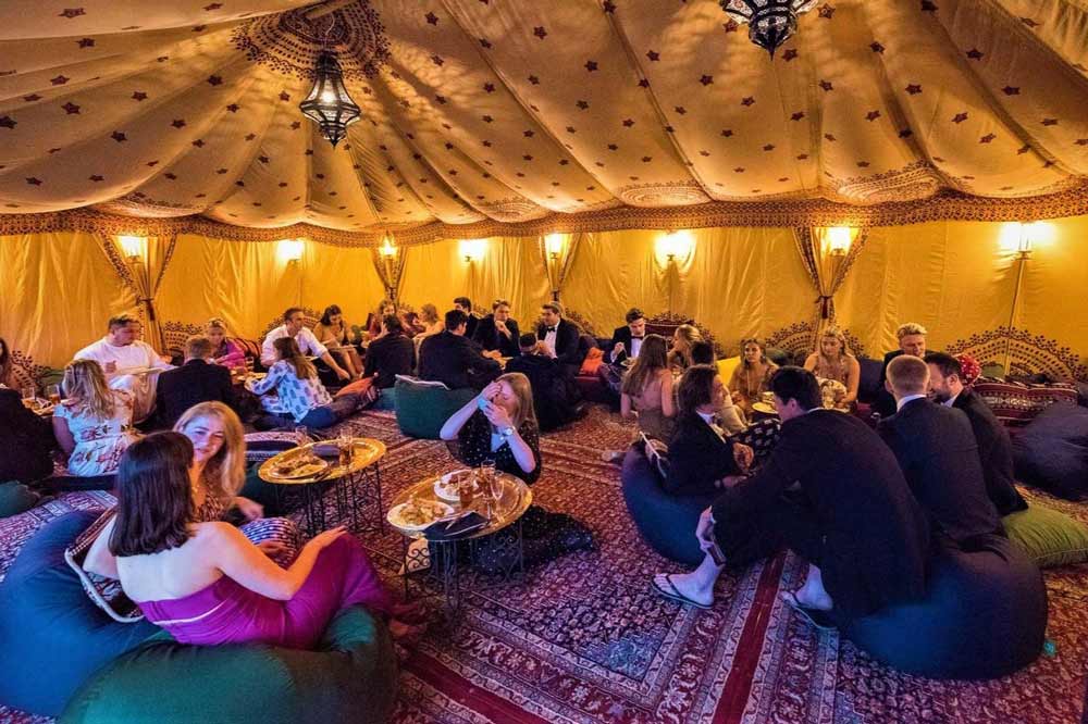 low-level seating inside a bedouin tent