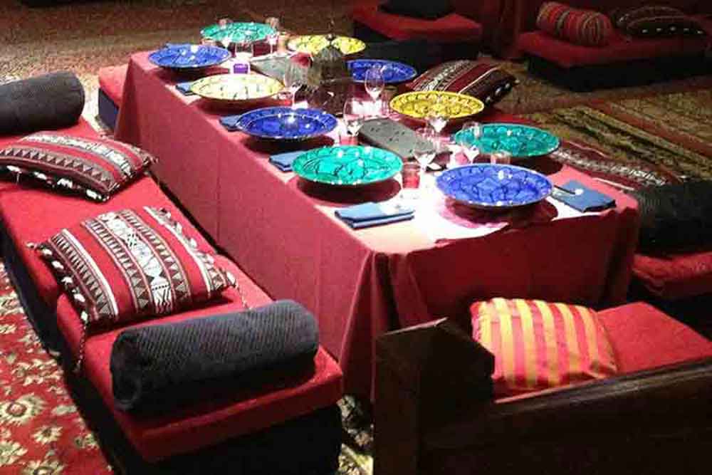 Low-Level Ottoman Banqueting Table with Arabian Cushions - Unique Dining Experience