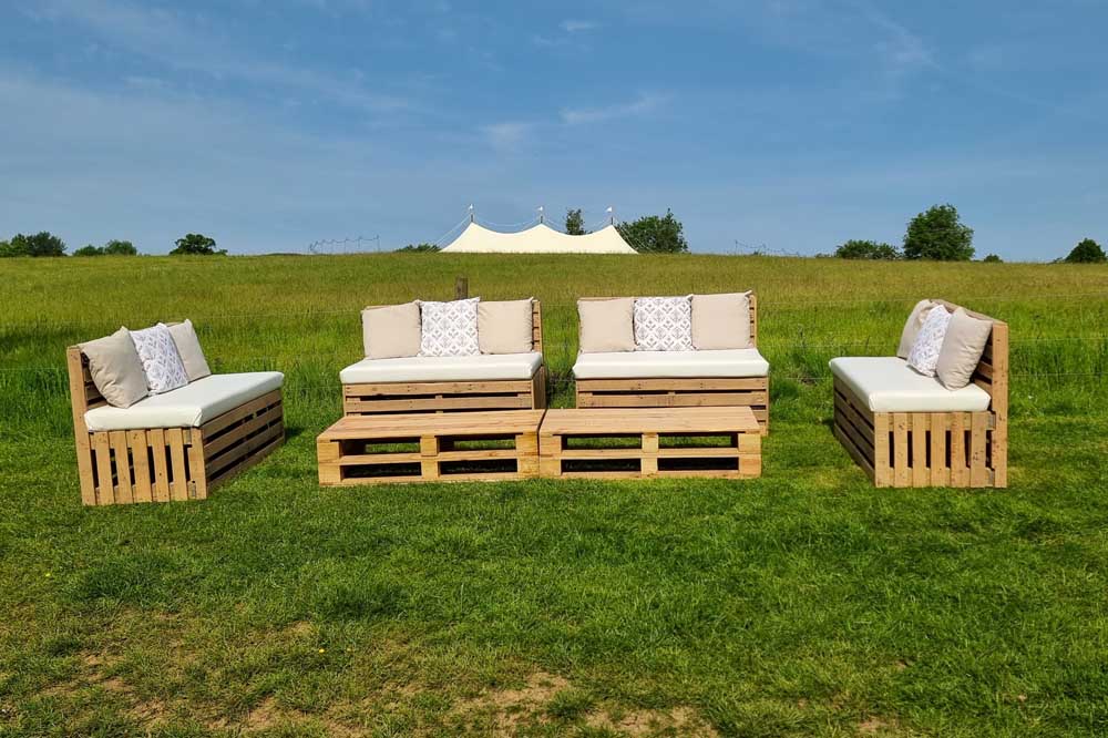 Four Pallet Benches Hired with a Marquee