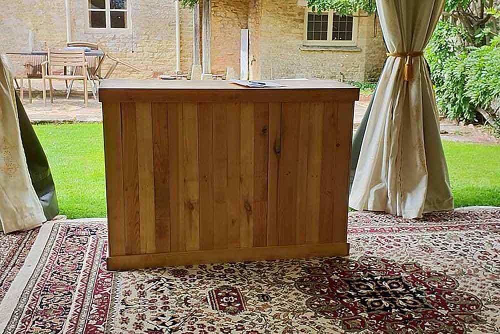 A reclaimed pallet bar unit for serving drinks indoors or outdoors.