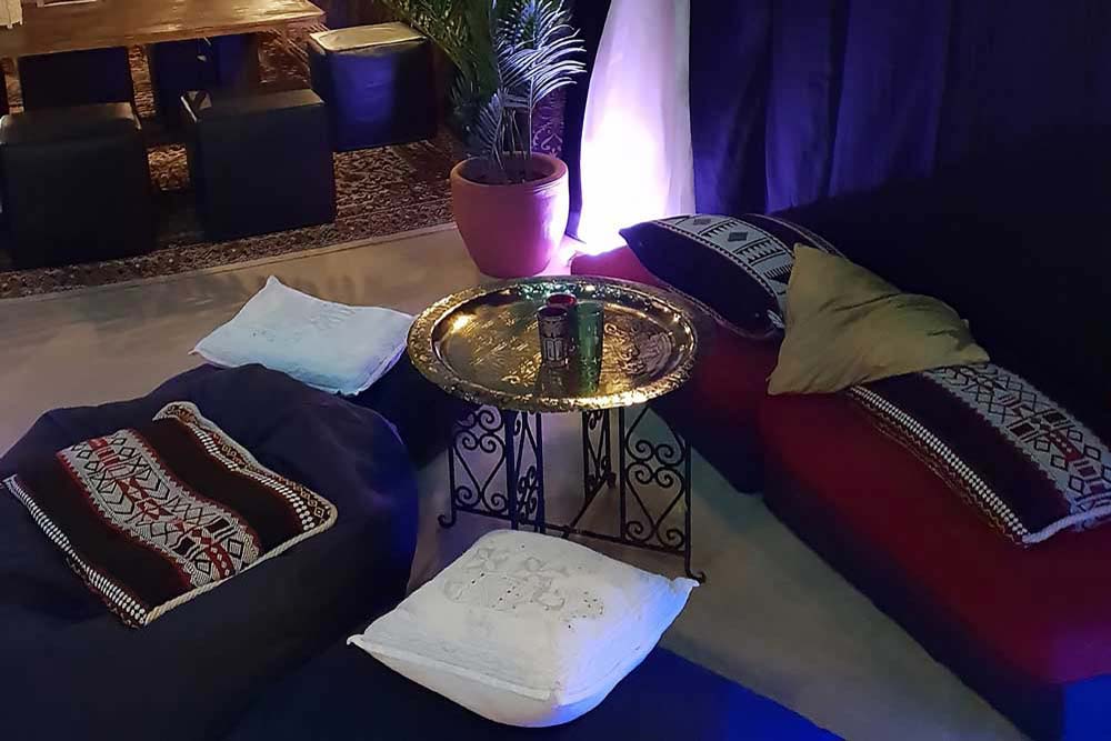 Polished Brass Table with Moroccan Tea Glasses Lit with Tea Light Candles - Table Decorations