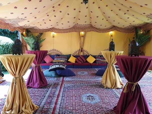 A Bedouin enguagement tent with poseur tables